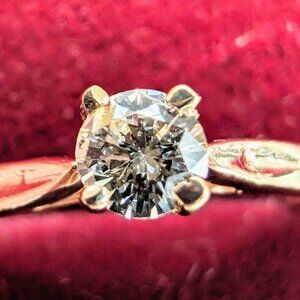 10k gold ring with brilliant cut natural .21 ct diamond with appraisal